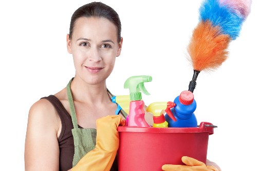 Professional Airbnb cleaner preparing a guest-ready flat in Merton