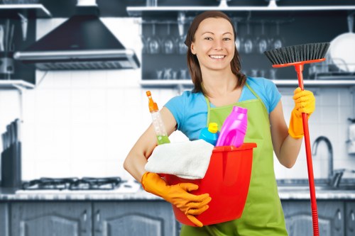 Commercial office cleaner working in a Merton business property