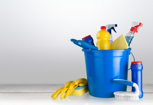 Routine cleaning of a kitchen and living area in Merton