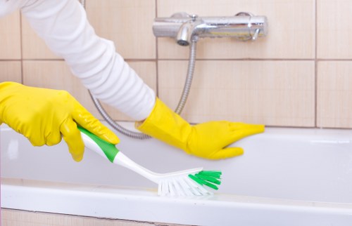 Cleaner using safe procedures while carrying equipment in a controlled environment