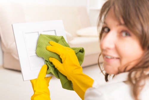 Cleaning staff servicing a business interior with floors and reception areas